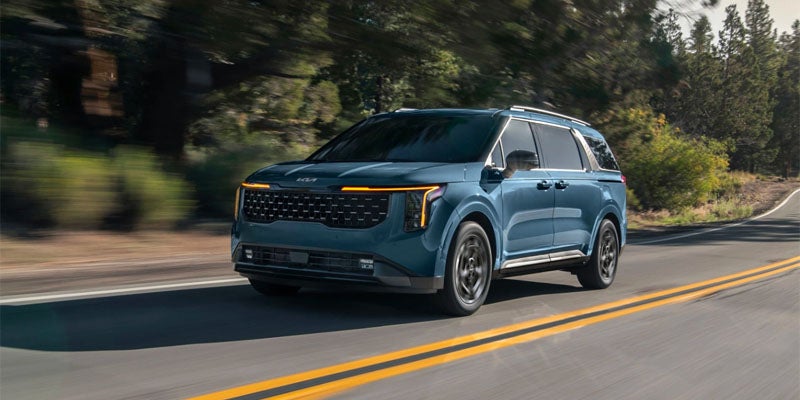 2025 Kia Carnival driving on road