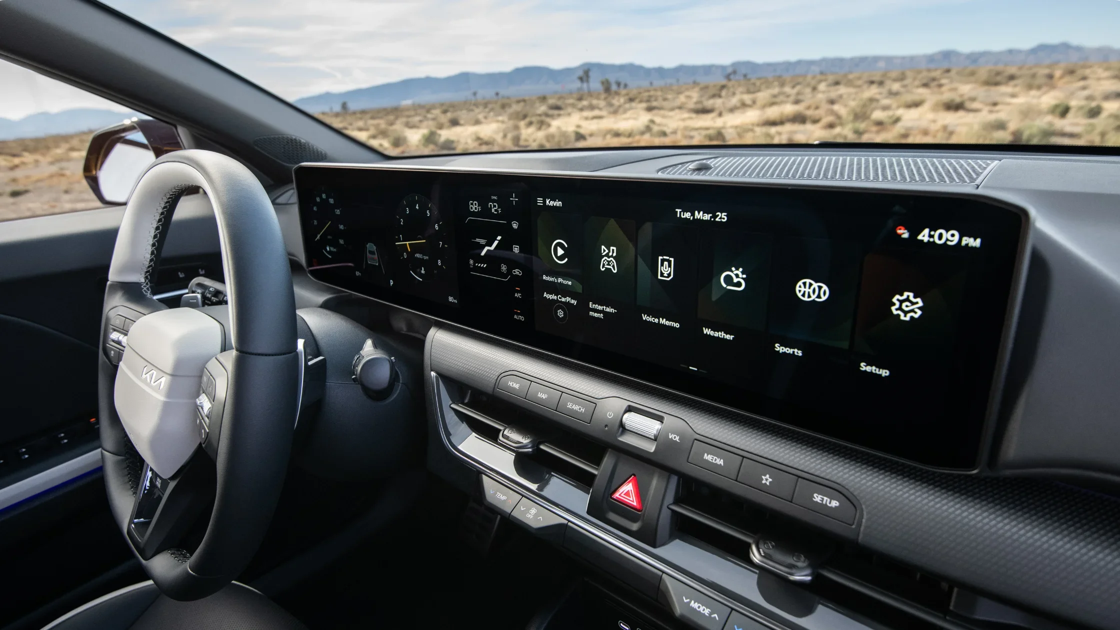 2026 Kia K4 Hatchback interior cockpit with widescreen digital display and modern driver controls.