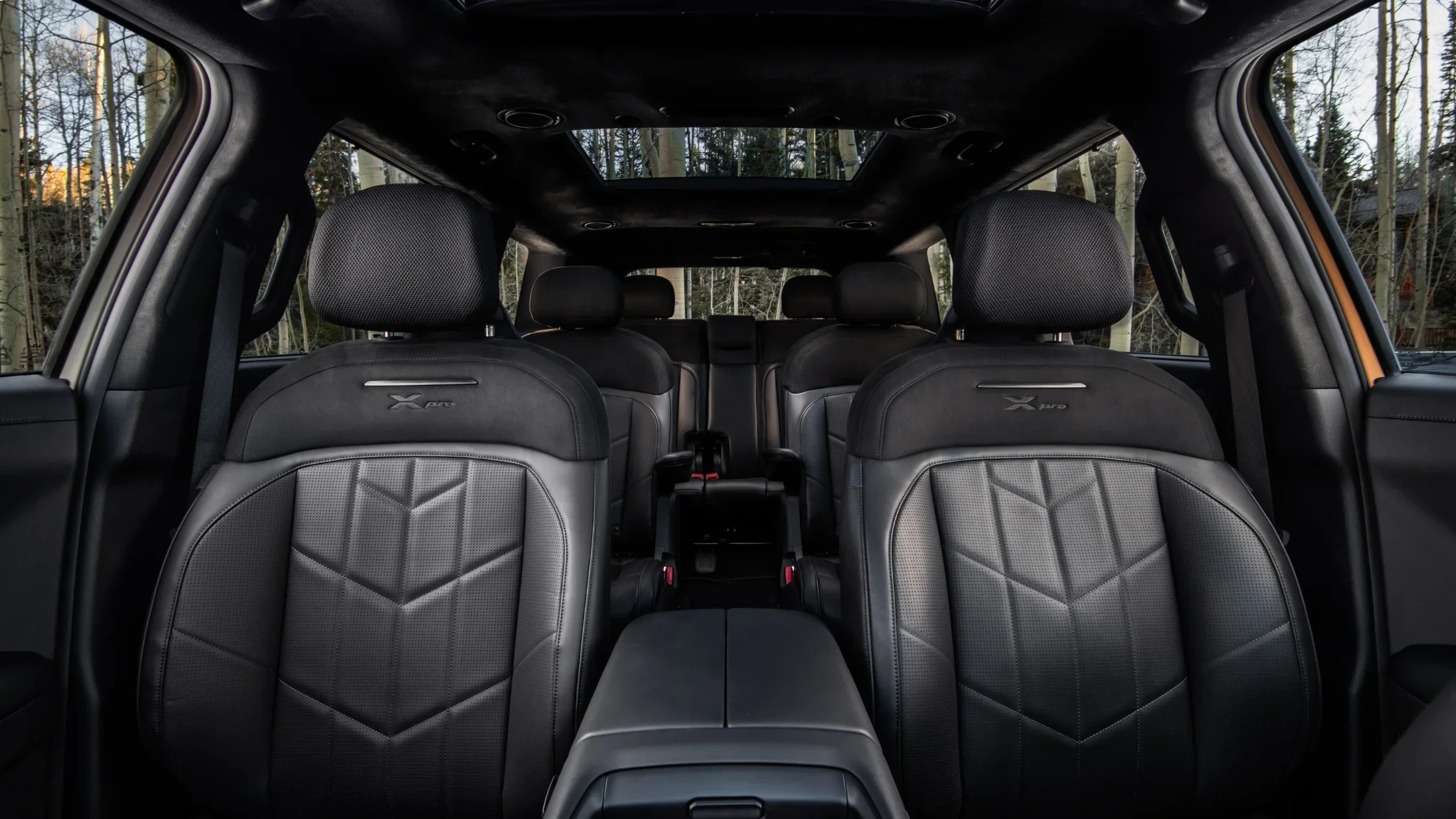 2027 Kia Telluride front seats featuring X Pro trim stitching and spacious SUV interior.