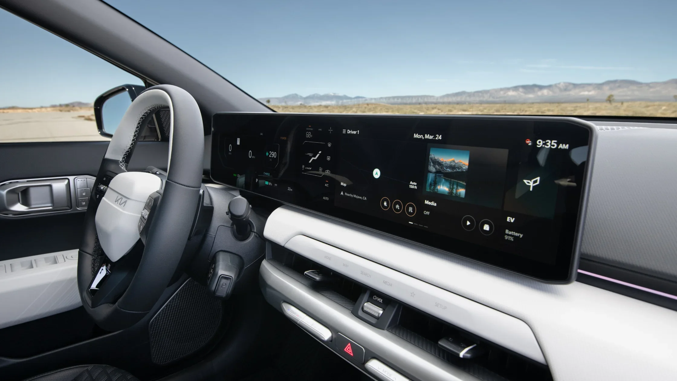 2026 Kia EV4 interior dashboard with curved touchscreen display and steering wheel.